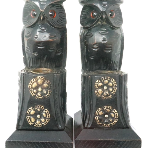 334 - Pair of Black Forest style carved wood candlesticks with brass mounts, each H: 27 cm. P&P Group 1 (£... 