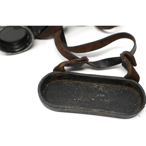 431 - Pair of German WWII period binoculars with traces of desert paint. P&P Group 1 (£14+VAT for the firs... 