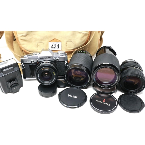 434 - Olympus OM-30 photographic outfit with mixed lenses. P&P Group 2 (£18+VAT for the first lot and £3+V... 