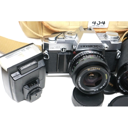 434 - Olympus OM-30 photographic outfit with mixed lenses. P&P Group 2 (£18+VAT for the first lot and £3+V... 