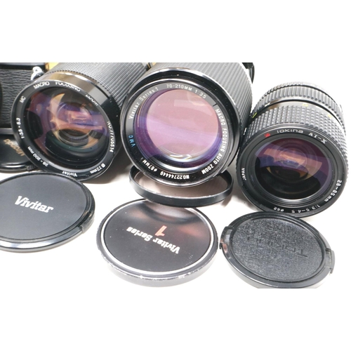 434 - Olympus OM-30 photographic outfit with mixed lenses. P&P Group 2 (£18+VAT for the first lot and £3+V... 