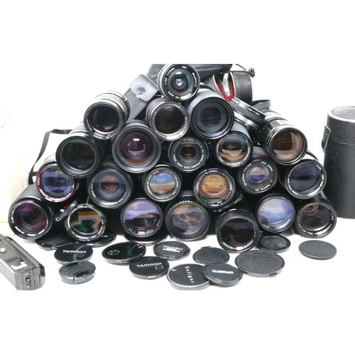 435 - A large selection of lenses, including Canon, Vivitar, Tamron and others. P&P Group 2 (£18+VAT for t... 