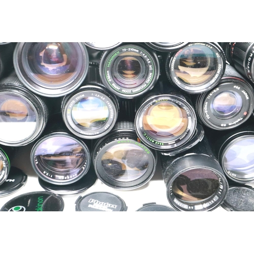 435 - A large selection of lenses, including Canon, Vivitar, Tamron and others. P&P Group 2 (£18+VAT for t... 