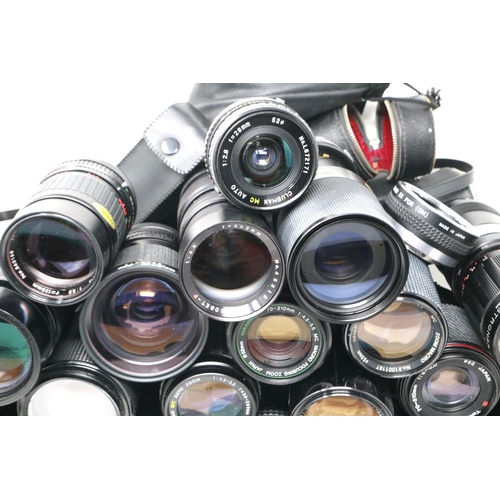 435 - A large selection of lenses, including Canon, Vivitar, Tamron and others. P&P Group 2 (£18+VAT for t... 