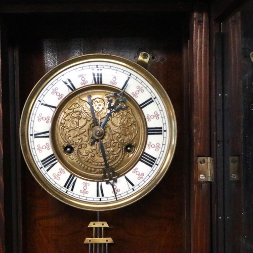 331 - A 19th century Vienna style wall clock, single weight, with pendulum display door. Not available for... 