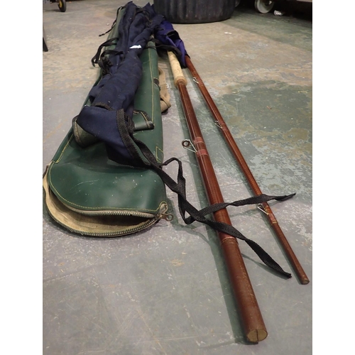 1141 - Three fishing rods and bag to include a Bruck & Walker CTM13A. Not available for in-house P&P