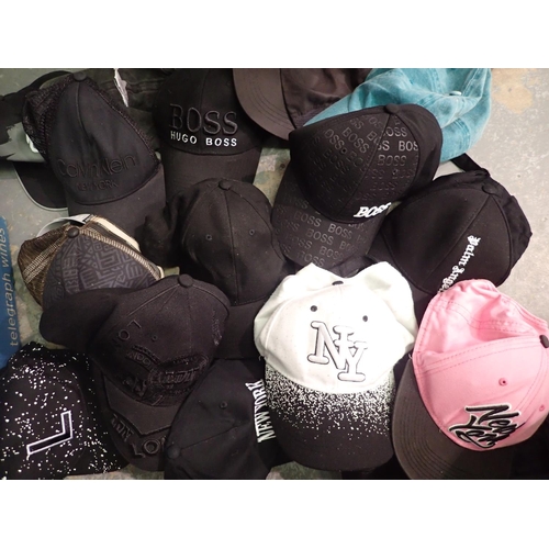 1150 - Twenty three branded and unbranded baseball hats. Not available for in-house P&P