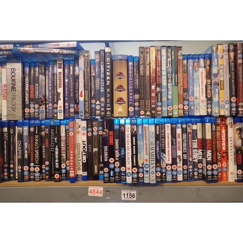 1156 - Shelf of mixed genre Blu-rays and DVDs. Not available for in-house P&P