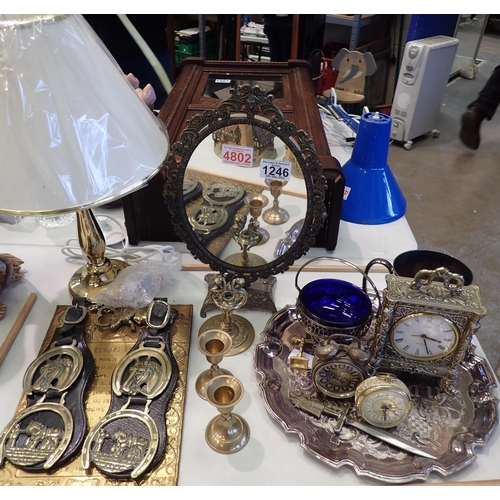 1246 - Mixed brassware including an oval table mirror, alarm clocks, candlesticks etc, with an quantity of ... 