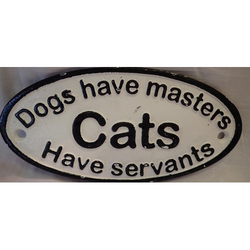 1249 - Cast iron Dogs Have Masters sign. P&P Group 1 (£14+VAT for the first lot and £1+VAT for subsequent l... 