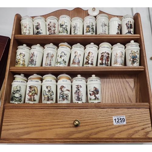 1259 - Ceramic jars and a spice rack. Not available for in-house P&P