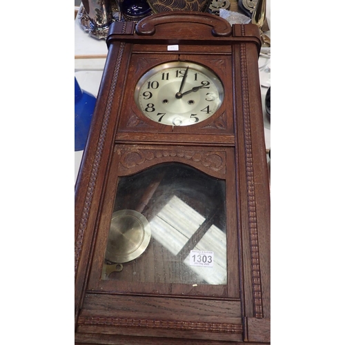 1303 - Mahogany cased wall clock, requires attention. Not available for in-house P&P