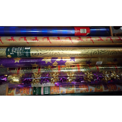 1308 - Large quantity of Christmas decorations and wrapping paper. Not available for in-house P&P