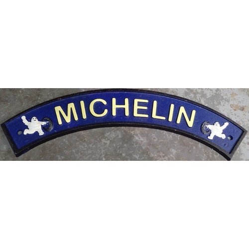 1181 - Cast iron curved Michelin sign, W: 30 cm. P&P Group 1 (£14+VAT for the first lot and £1+VAT for subs... 