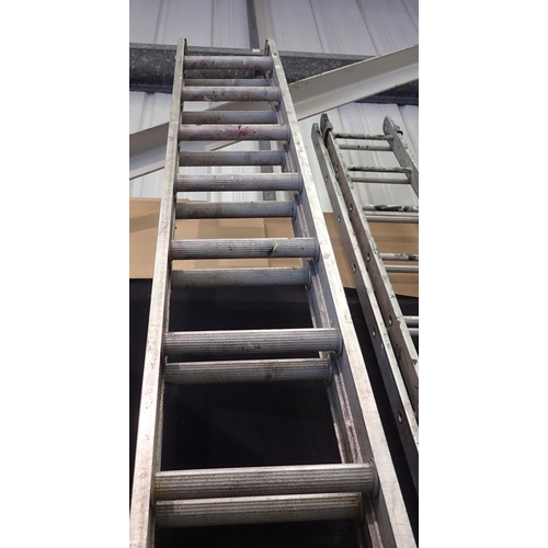 1716 - Large set of double extending ladders. Not available for in-house P&P