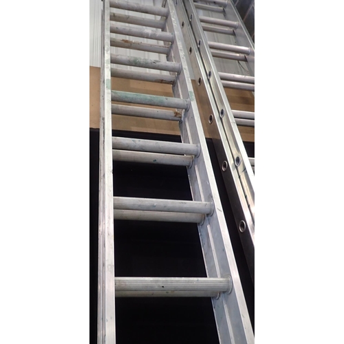 1718 - Set of double extending ladders. Not available for in-house P&P