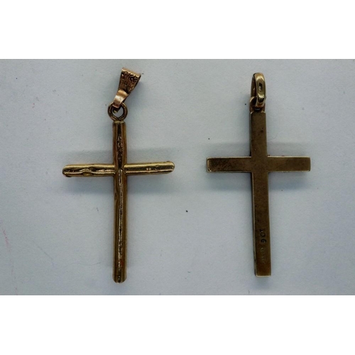 21 - Two 9ct gold cruciform pendants, largest H: 30 mm, 1.8g. P&P Group 1 (£14+VAT for the first lot and ... 