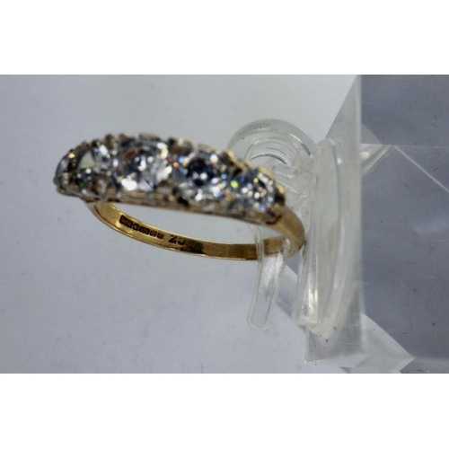 57 - 9ct gold ring set with five graduating cubic zirconia, size J, 1.8g. P&P Group 1 (£14+VAT for the fi... 