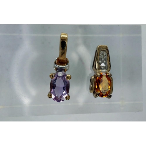 66 - Two yellow metal pendants, one marked 9ct, one set with diamonds, combined 1.0g. P&P Group 1 (£14+VA... 