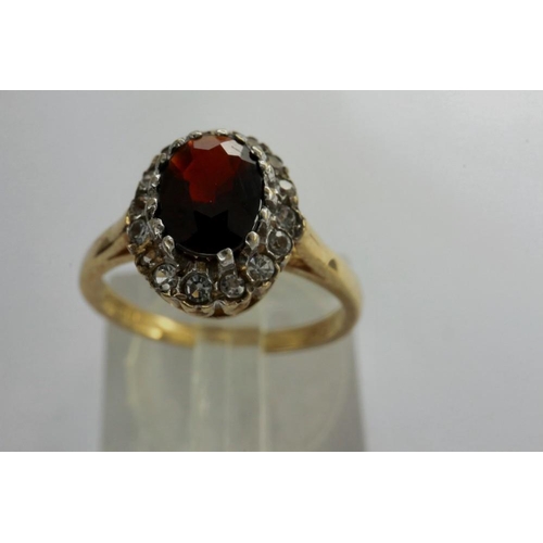 68 - 9ct gold cluster ring set with garnet and cubic zirconia, size J, 2.2g. P&P Group 1 (£14+VAT for the... 