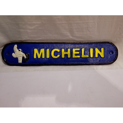 1021 - Cast iron Michelin sign, W: 20 cm. P&P Group 1 (£14+VAT for the first lot and £1+VAT for subsequent ... 