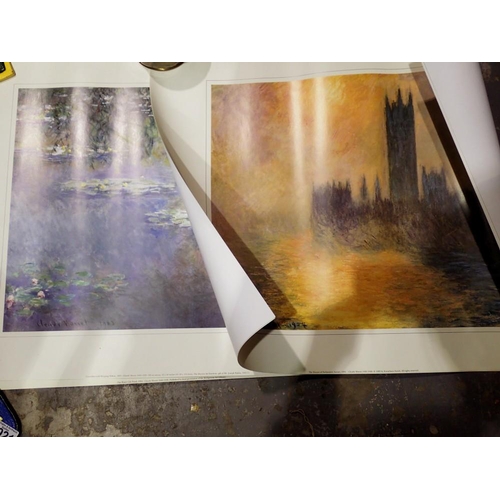 1024 - Four unframed Monet prints. P&P Group 2 (£18+VAT for the first lot and £3+VAT for subsequent lots)