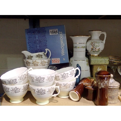 1045 - Quantity of mixed ceramics including a boxed Wedgwood tankard and tea/dinner service. Not available ... 