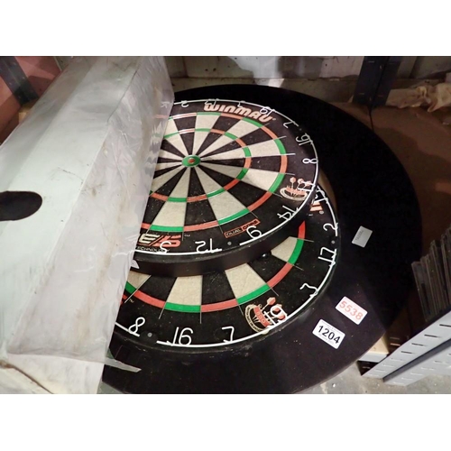 1204 - Two good quality dartboards a dartboard surround and mat. Not available for in-house P&P