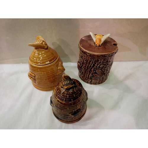 1232 - Three ceramic covered honeypots, two have chips/cracks to rim otherwise good. P&P Group 2 (£18+VAT f... 