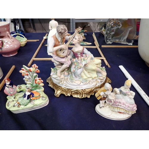 1233 - Capodimonte figural group and two others (3). Not available for in-house P&P