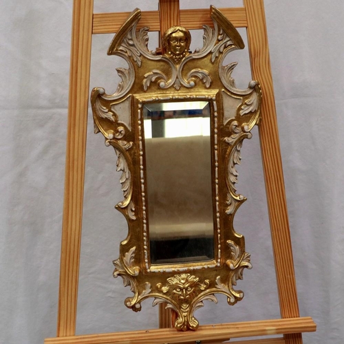 2090 - Contemporary Italianate gilt framed wall mirror, 62 x 31 cm. Not available for in-house P&P