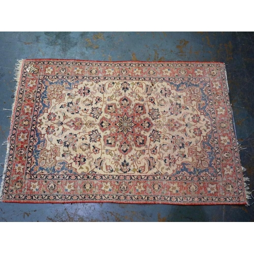 2095 - Early 20th century floor rug with designs in blue against a red faded ground, 155 x 100 cm. Not avai... 