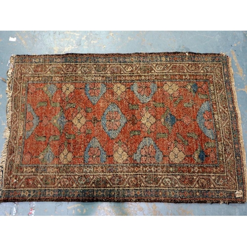 2096 - Late 19th century hand knotted floor rug with designs against an orange ground, 120 x 76 cm. Not ava... 