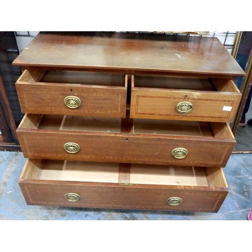 2102 - An Edwardian walnut chest of two short above two long drawers, inlaid with satinwood and ebony strin... 