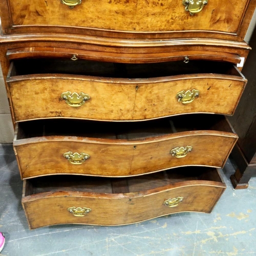 2103 - Burr walnut serpentine fronted chest on chest, comprising two short over seven long drawers. Not ava... 