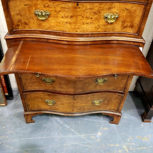 2103 - Burr walnut serpentine fronted chest on chest, comprising two short over seven long drawers. Not ava... 