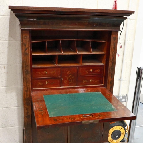 2104 - An early 19th century continental walnut scriptoire, with drop front and fitted interior, profusely ... 