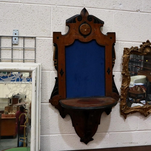 2107 - An early 19th century walnut bracket, wall mounting with carved gilt and ebonised decoration, 52 x 2... 