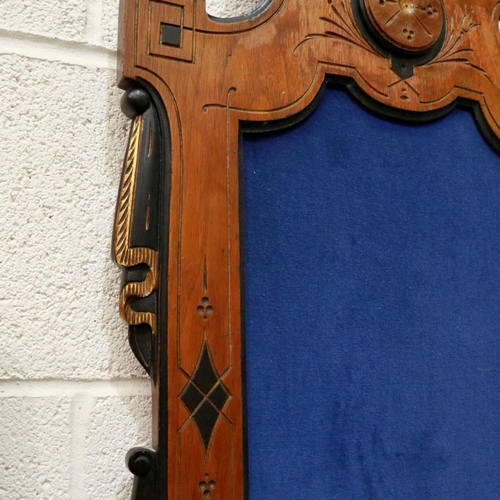 2107 - An early 19th century walnut bracket, wall mounting with carved gilt and ebonised decoration, 52 x 2... 