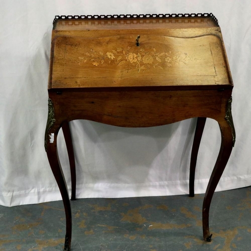 2111 - A French writing bureau of simple bombe from inlaid with flora and strung with ormolu mounts and gal... 