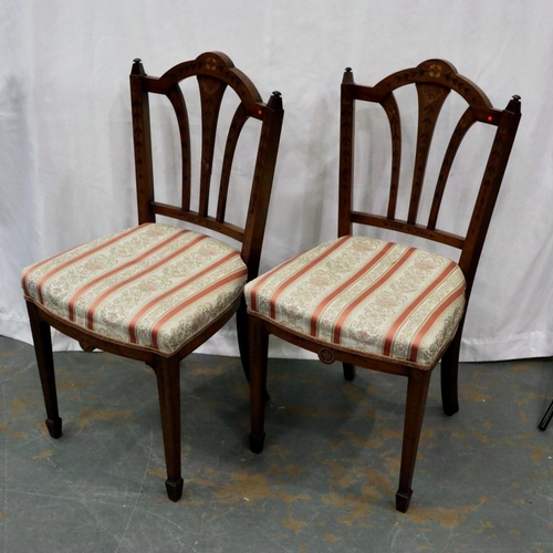 2112 - A pair of Arts and Crafts period parlour chairs, profusely inlaid throughout with later upholstered ... 