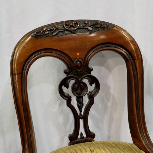 2129 - A Victorian carved walnut parlour chair with pierced back rest. Not available for in-house P&P