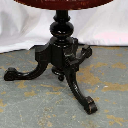 2130 - A 19th century lamp table with ebonised tripod support and replaced lather bound top, D: 40 cm, H: 4... 