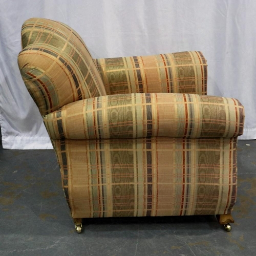 2134 - Edwardian scroll arm upholstered armchair on brass castors. Not available for in-house P&P