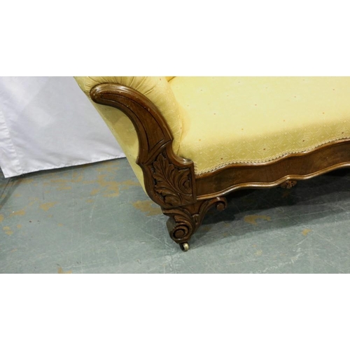 2139 - Carved walnut framed upholstered open settee on brass castors, L: 180 cm. Not available for in-house... 