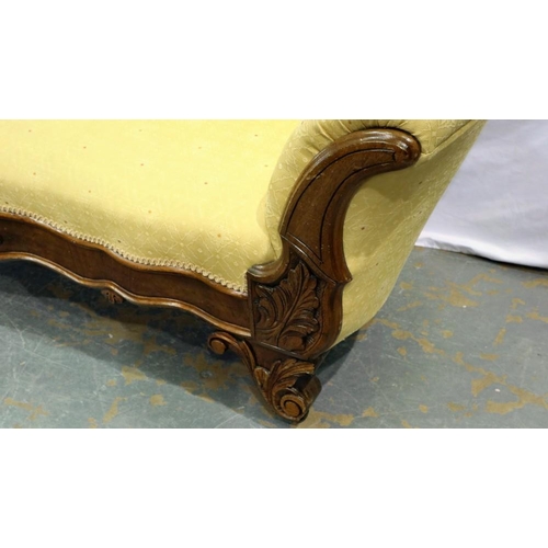 2139 - Carved walnut framed upholstered open settee on brass castors, L: 180 cm. Not available for in-house... 