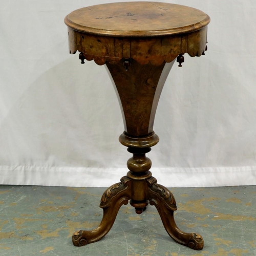 2145 - Victorian walnut sewing table on a carved tripod support, burr walnut under lid and fitted interior,... 