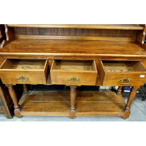 2147 - Oak dresser with shelf base, three drawers and plate rack, 145 x 42 x 190 cm H. Not available for in... 