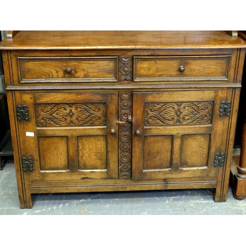 2148 - Oak sideboard with shelf top and two drawers over two cupboards, 120 x 45 x 185 cm H. Not available ... 