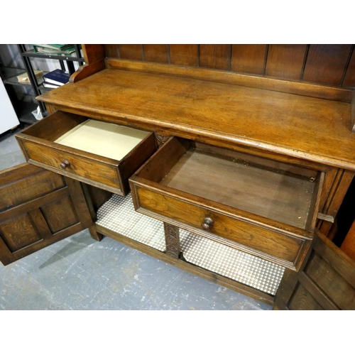 2148 - Oak sideboard with shelf top and two drawers over two cupboards, 120 x 45 x 185 cm H. Not available ... 